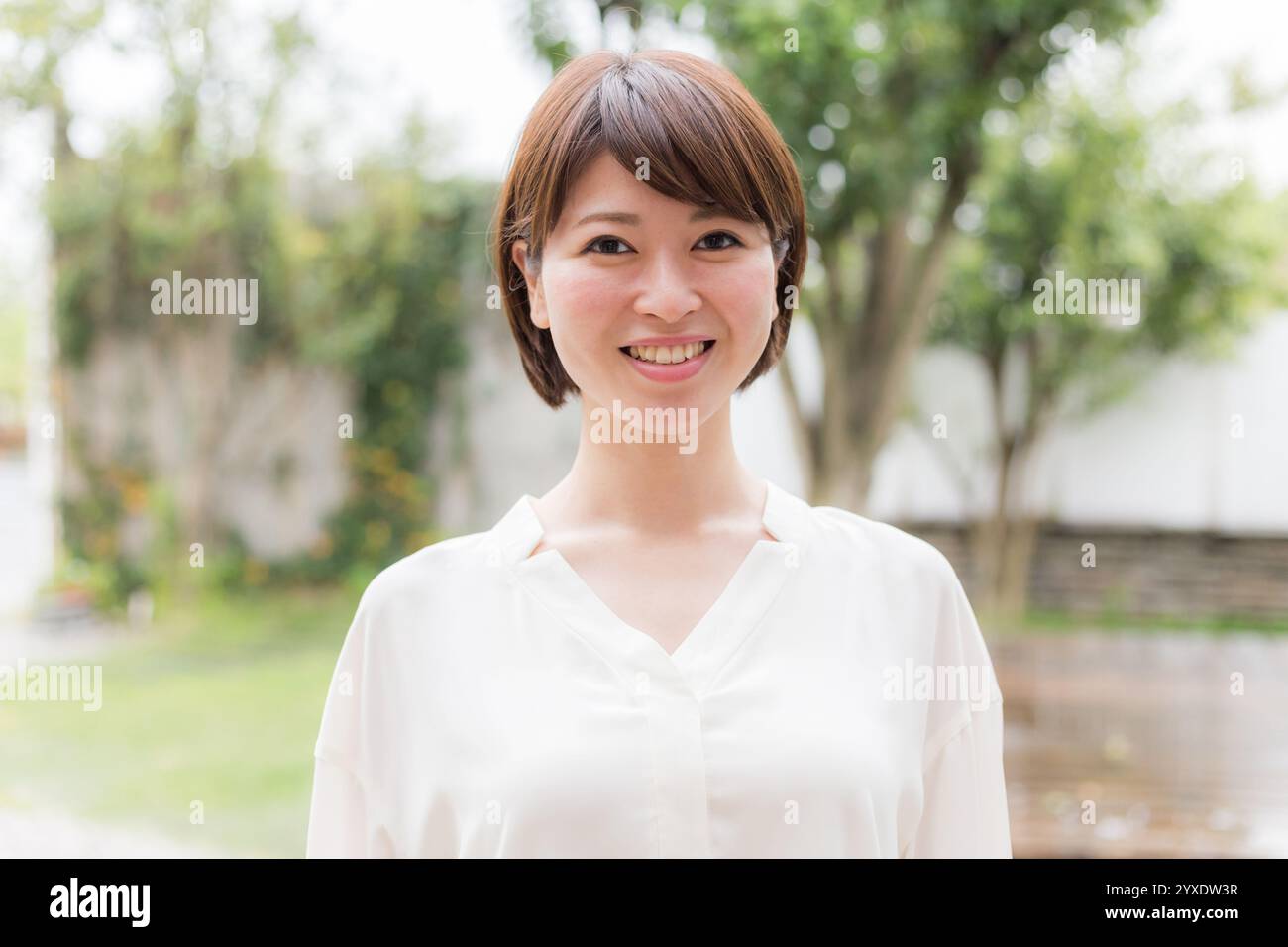 Young woman garden relax hi-res stock photography and images - Alamy