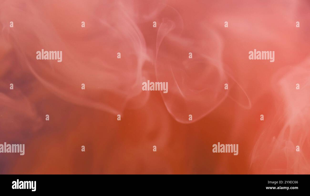 Fantastic fog. Smoke cloud. Defocused bright peach orange color splash ...