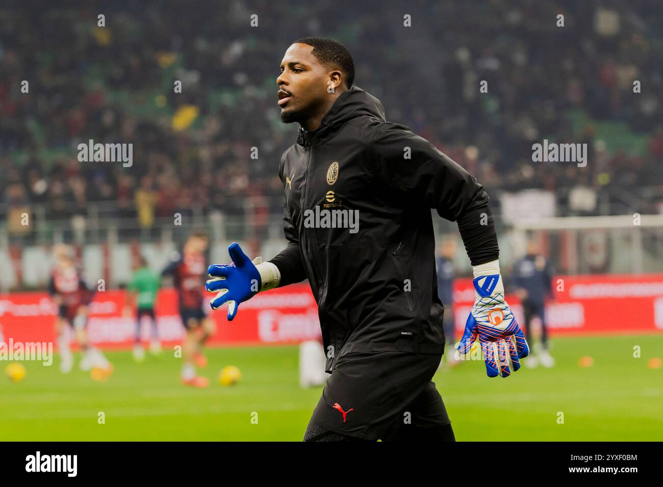 Milano, Italy. 15th Dec, 2024. Mike Maignan in action during Serie A match between AC Milan and Genoa on December 15 2024 at Giuseppe Meazza Stadium in Milano, Italy Credit: Mairo Cinquetti/Alamy Live News Stock Photo