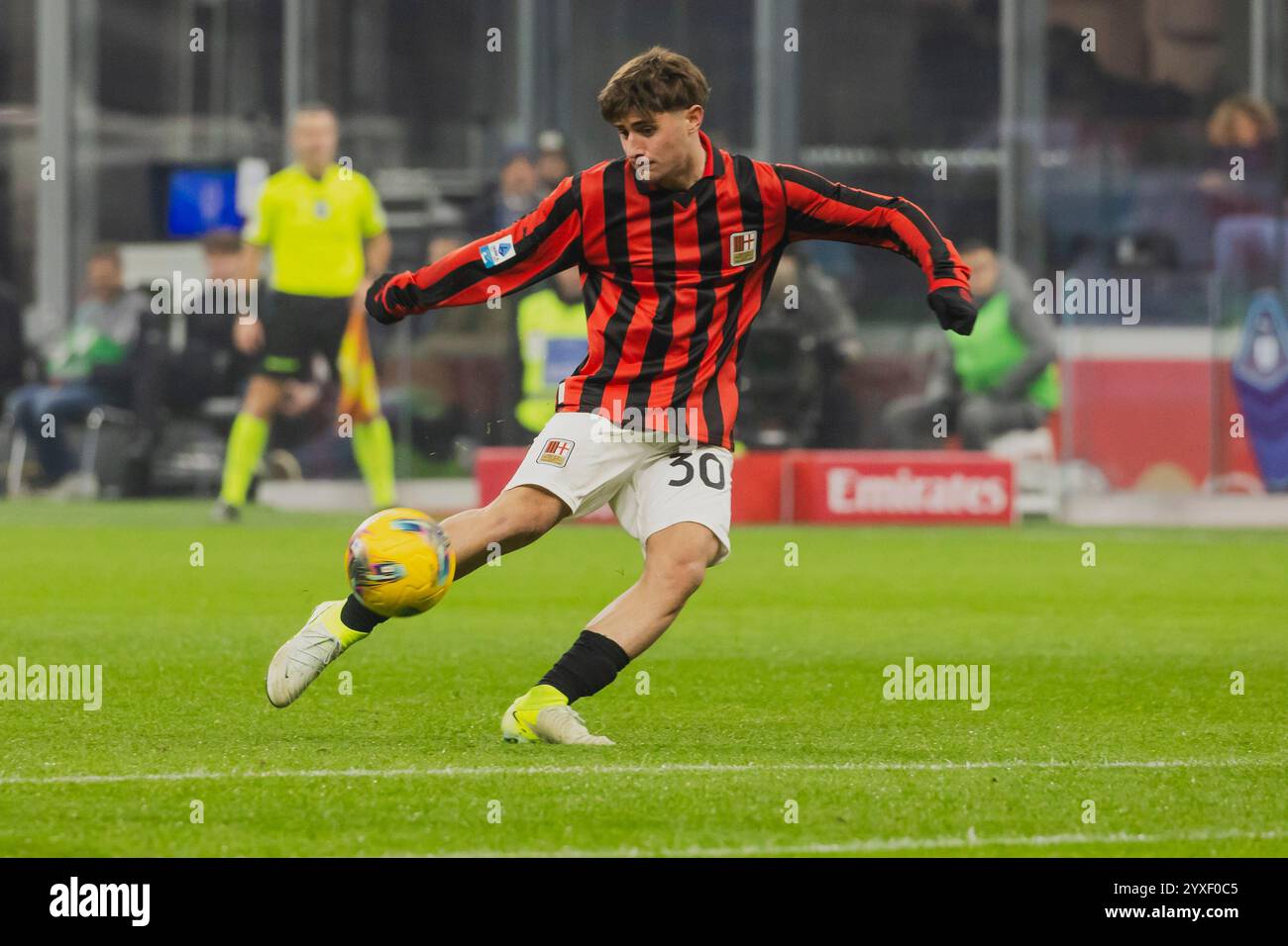 Milano, Italy. 15th Dec, 2024. Mattia Liberali in action during Serie A match between AC Milan and Genoa on December 15 2024 at Giuseppe Meazza Stadium in Milano, Italy Credit: Mairo Cinquetti/Alamy Live News Stock Photo