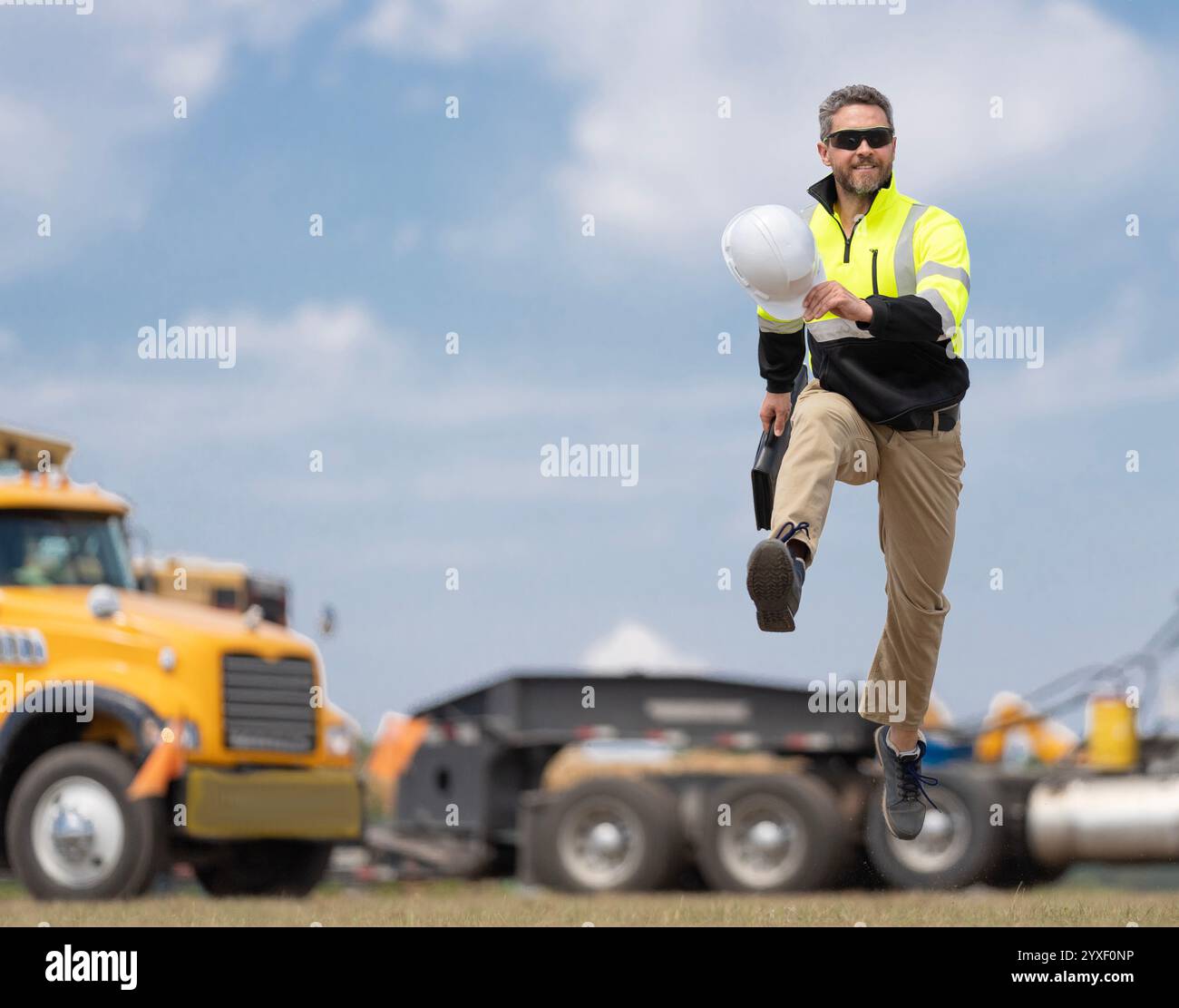 Construction builder excited jump hi-res stock photography and images ...