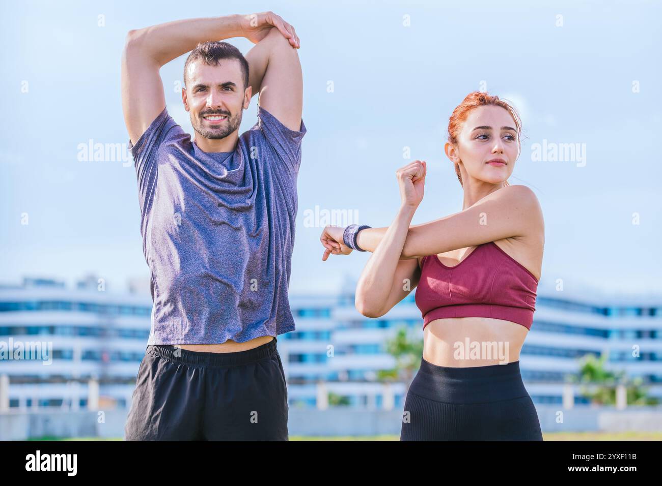 Athlete stretching arms hi-res stock photography and images - Alamy