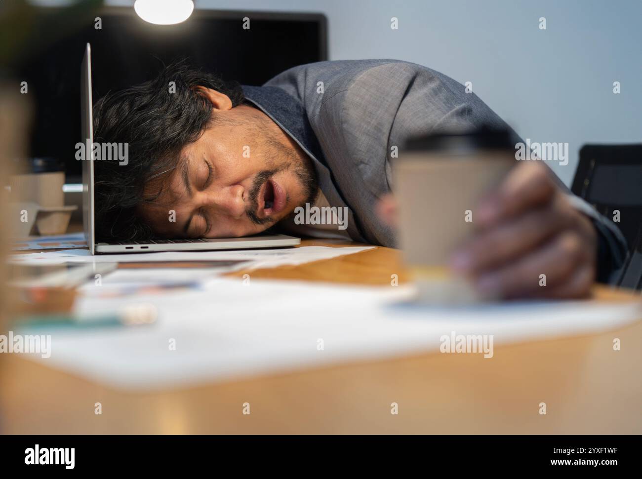 Worker sleeping in officer hi-res stock photography and images - Alamy
