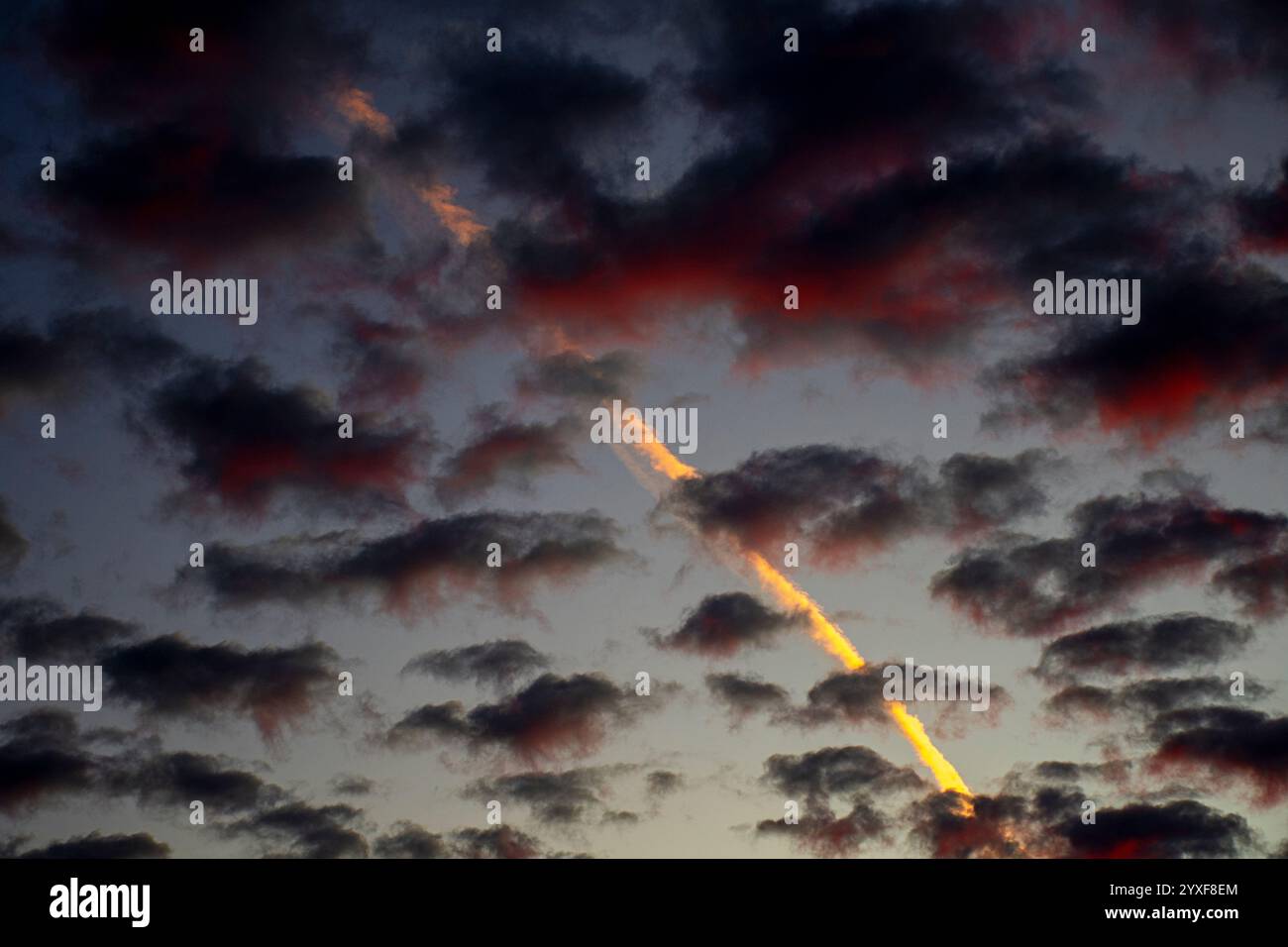 Airplane flying in rain clouds hi-res stock photography and images - Alamy