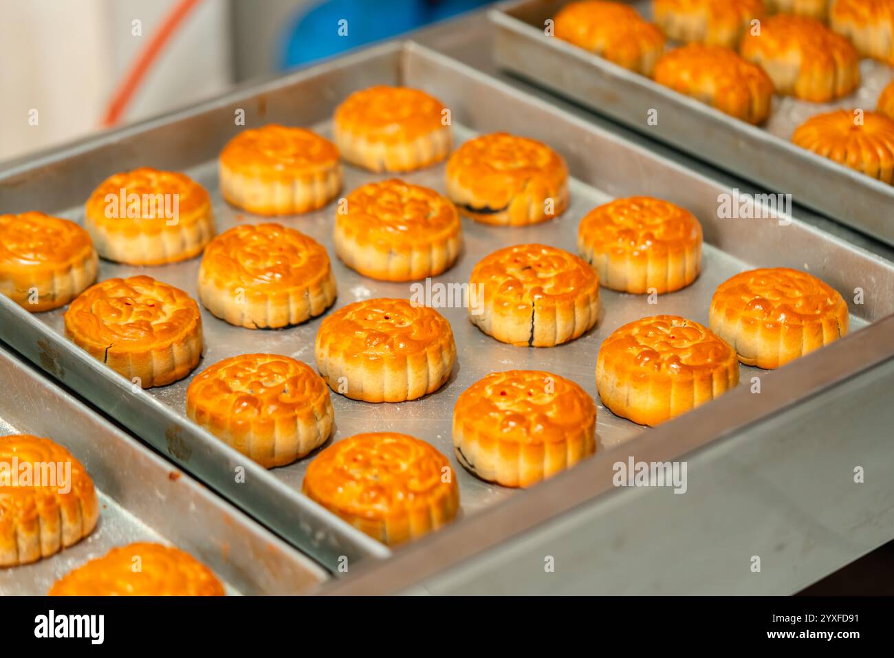 Mooncake making process. A mooncake is a Chinese bakery product ...