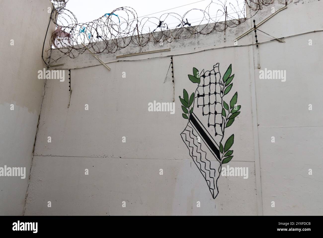 December 15, 2024: Bizerte, Tunisia. 15 December 2024. A graffiti of the Palestine map in keffiyeh style on the wall of the Borj Erroumi prison of Bizerte, northern Tunisia. The various writings and graffiti on the prison wall in Bizerte are the work of the prison's inmates. The Carthage Film Festival (JCC) is a prestigious cultural event in Tunisia, with this year's film event including a program titled ''Palestine at the Heart of the JCC' (Credit Image: © Hasan Mrad/IMAGESLIVE via ZUMA Press Wire) EDITORIAL USAGE ONLY! Not for Commercial USAGE! Stock Photo