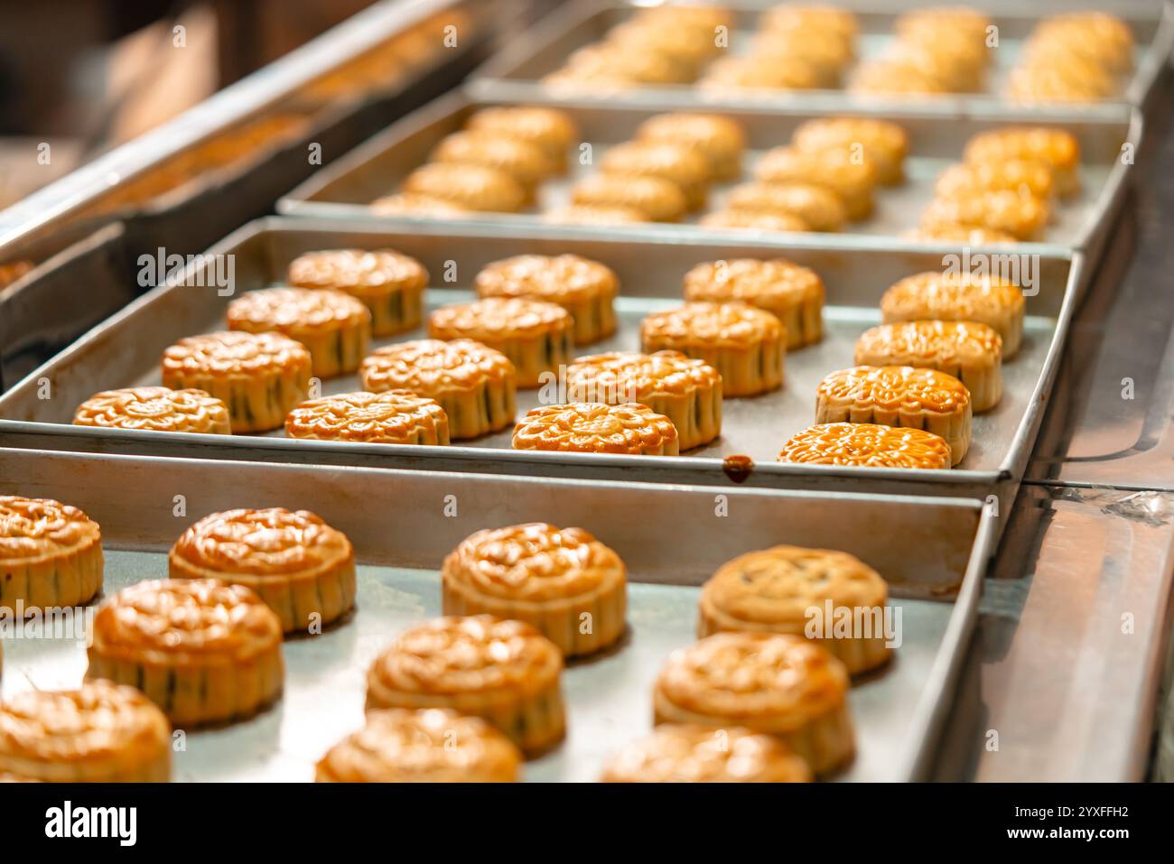Mooncake making process. A mooncake is a Chinese bakery product ...