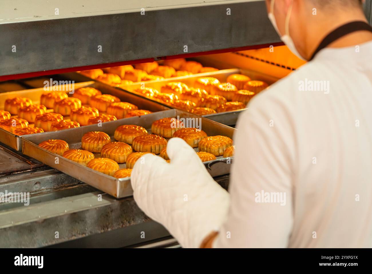 Mooncake making process. A mooncake is a Chinese bakery product ...