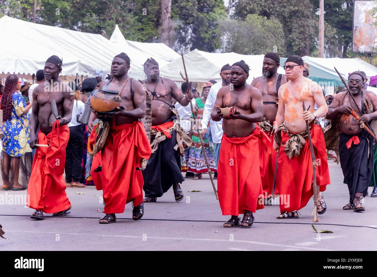 Yaounde, Cameroon. 15th Dec, 2024. People in traditional dresses are
