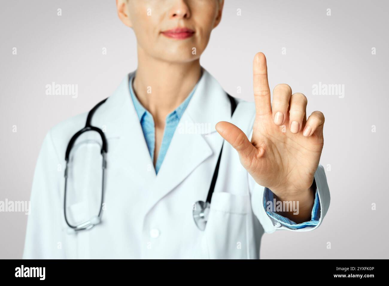 Doctor Invisible Technology for medical purposes. Doctor using invisible touchscreen and ...