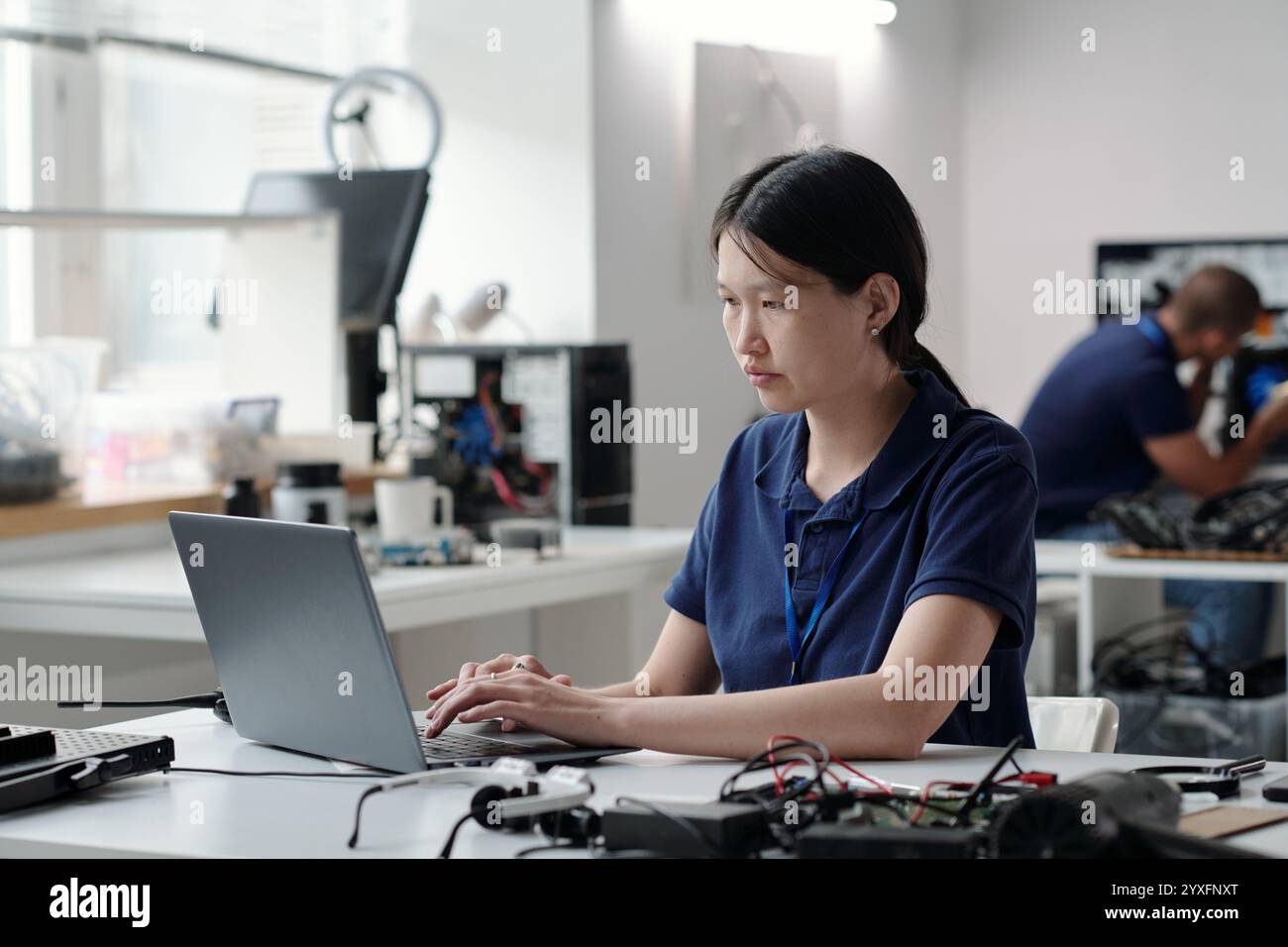 Working in Technology Laboratory on Modern Devices Stock Photo