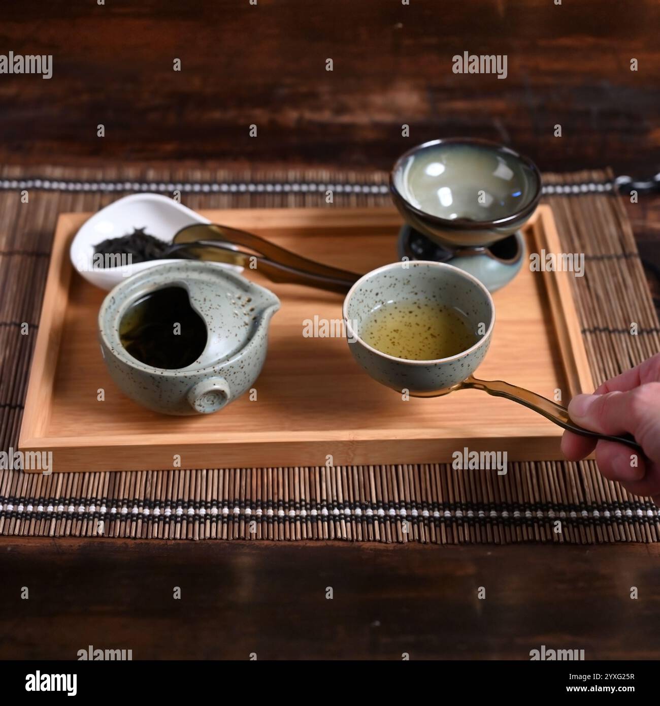 Hand Over Tea Female hand serves tea hi-res stock photography and images - Alamy