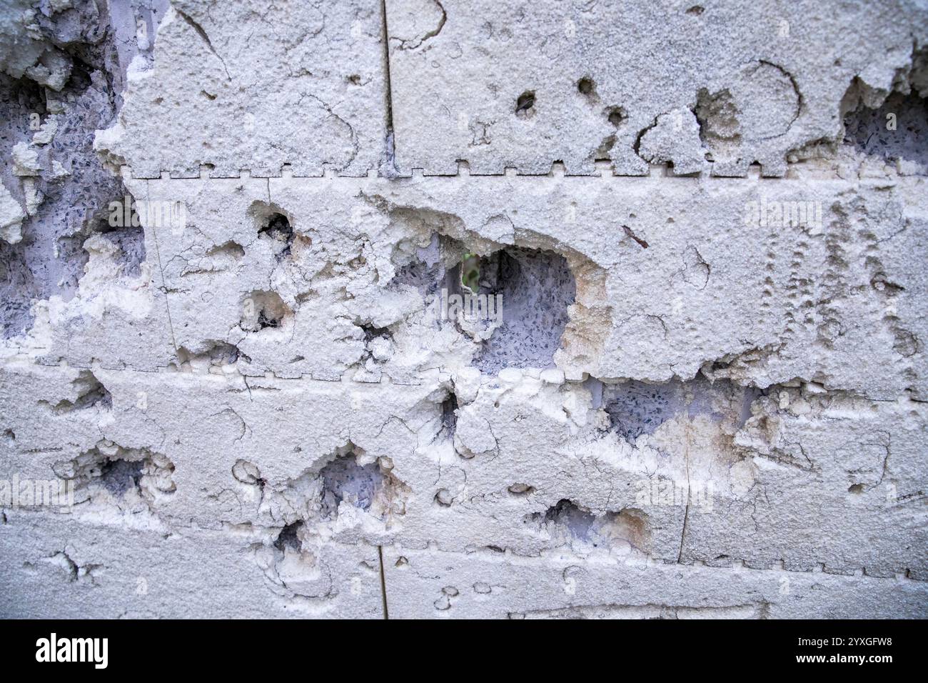 Rusty Bullet Holes on Metal Surface, Symbol of War and Conflict Stock Photo