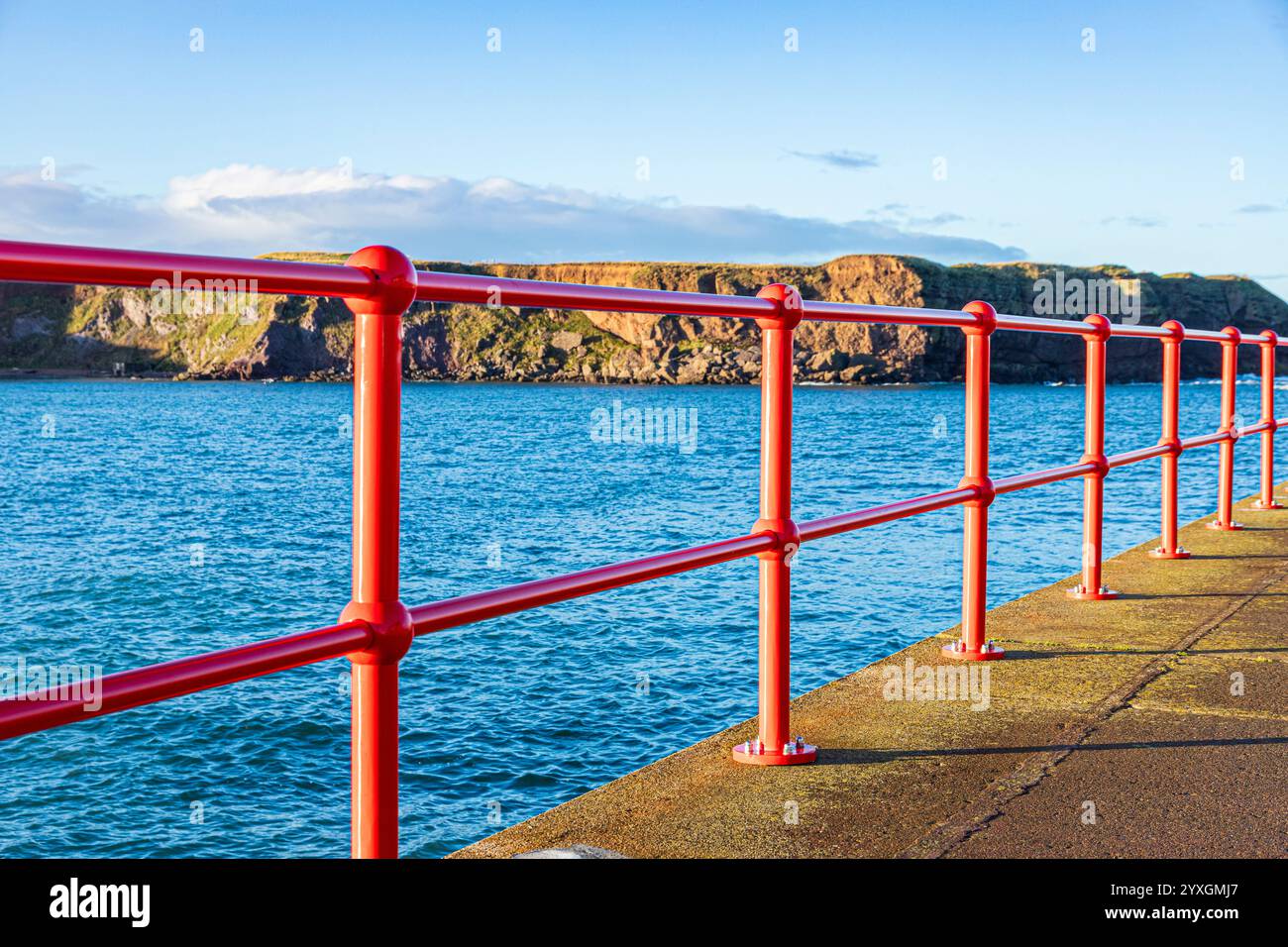 Shiny new red railings on West Pier in the harbour at Eyemouth ...