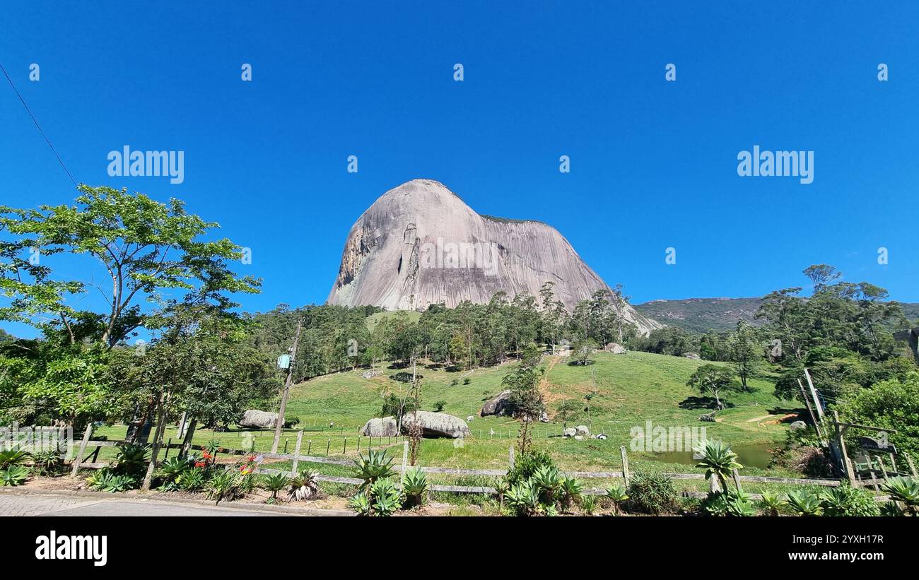 This breathtaking image showcases Pedra Azul, a massive granite monolith located in the state of Espírito Santo, Brazil. - Smartphone Captured Stock Image