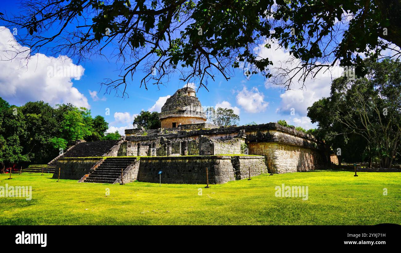 View of the El Caracol and temple platform,ancient Maya observatory,906 AD with a spiral staircase for astronomy purposes at Chichen Itza,Mexico Stock Photo