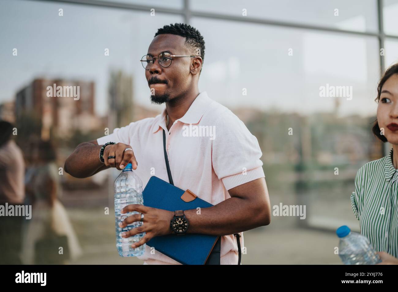 Multicultural professionals taking a break during urban business ...