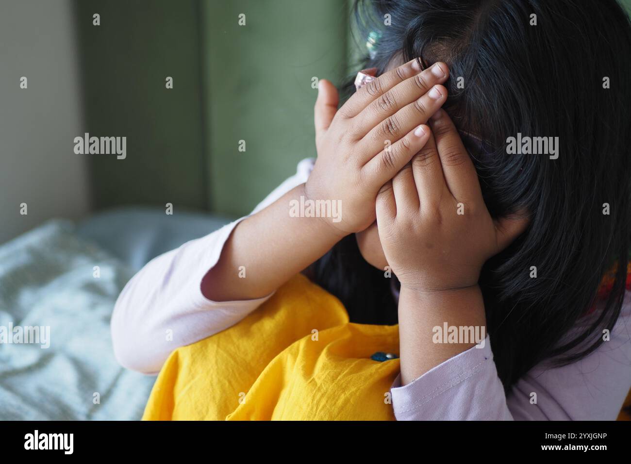 Upset child girl cover face hi-res stock photography and images - Alamy