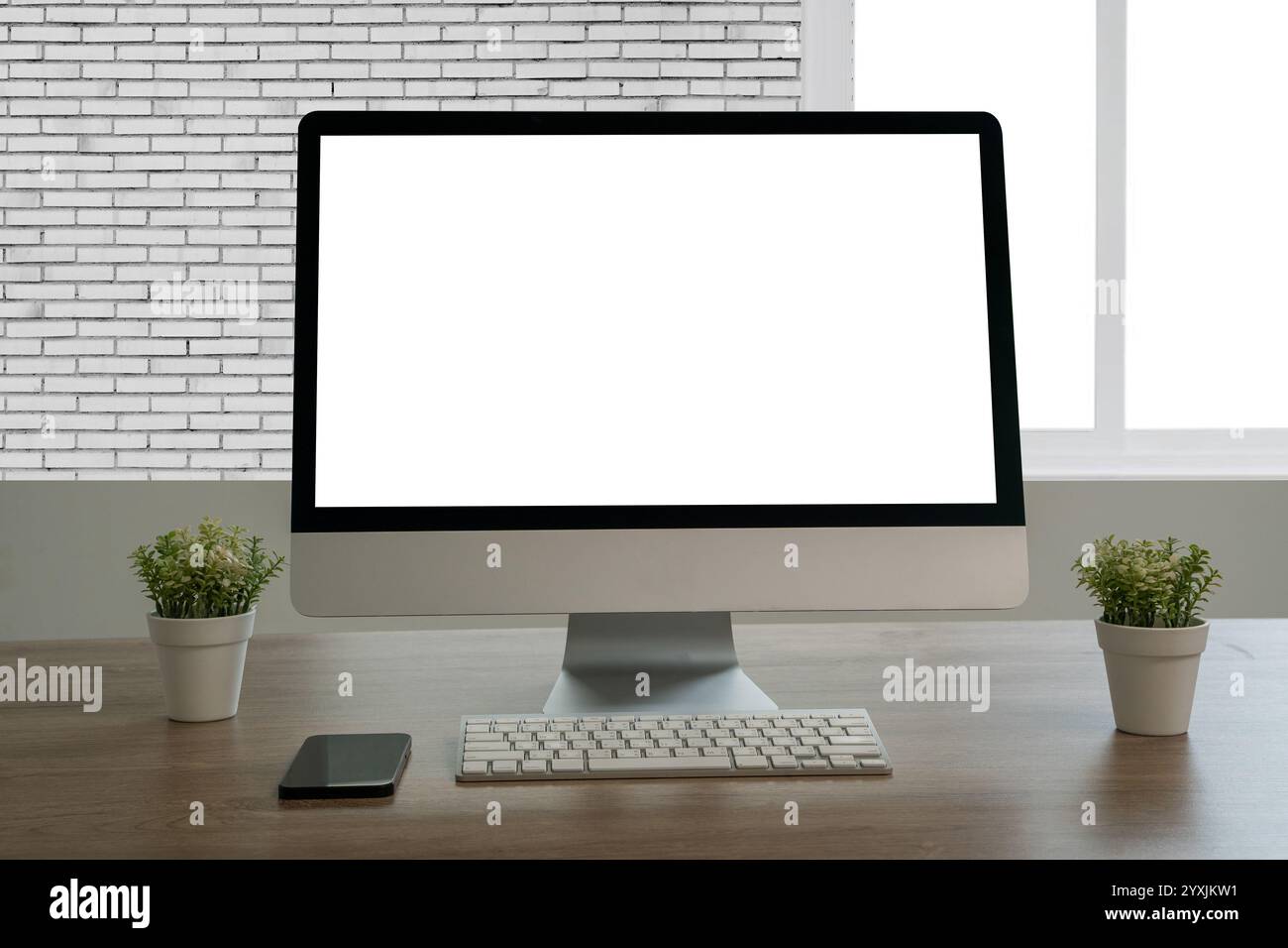 man working on laptop empty screen computer with white background for advertising text Stock Photo