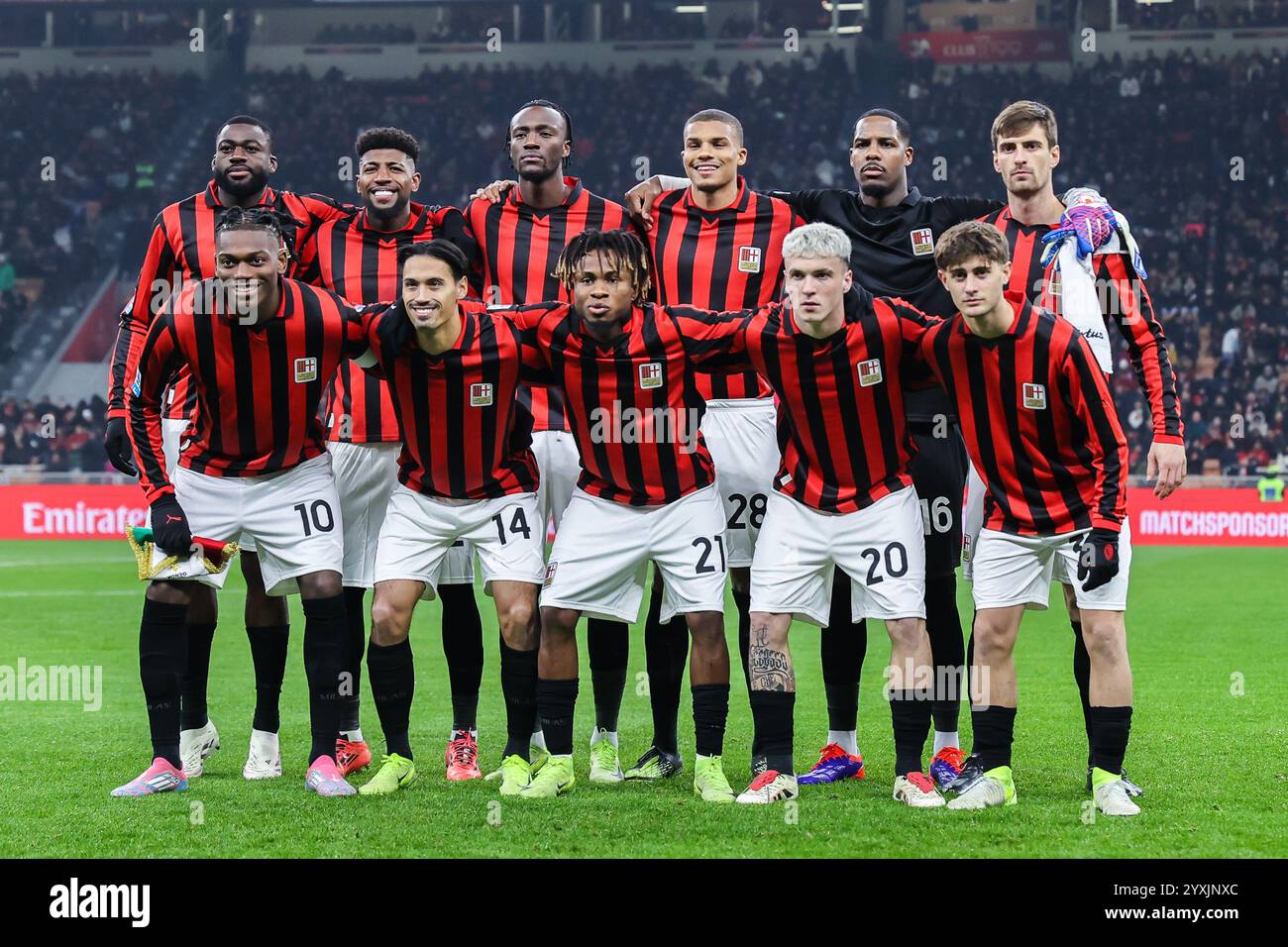 Milan, Italy. 15th Dec, 2024. (L-R back row) Youssouf Fofana, Emerson Royal, Tammy Abraham, Malick Thiaw, Mike Maignan, Matteo Gabbia, (L-R front row) Rafael Leao, Tijjani Reijnders, Samuel Chukwueze, Alejandro Jimenez and Mattia Liberali of AC Milan line up with AC Milan 125th Anniversary Jersey during Serie A 2024/25 football match between AC Milan and Genoa CFC at San Siro Stadium. (Photo by Fabrizio Carabelli/SOPA Images/Sipa USA) Credit: Sipa USA/Alamy Live News Stock Photo