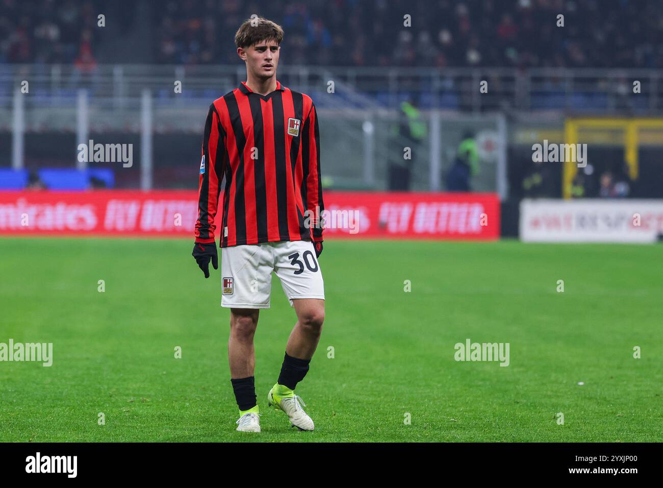 Milan, Italy. 15th Dec, 2024. Mattia Liberali of AC Milan seen in action during Serie A 2024/25 football match between AC Milan and Genoa CFC at San Siro Stadium. (Photo by Fabrizio Carabelli/SOPA Images/Sipa USA) Credit: Sipa USA/Alamy Live News Stock Photo