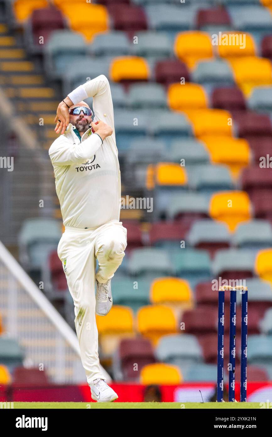 Brisbane, Australia, 17 December, 2024. Nathan Lyon of Australia bowls during Day 4 of the third NRMA Insurance Test match of Border Gavaskar trophy between Australia and India at the The Gabba on December 17, 2024 in Brisbane, Australia. Credit: Santanu Banik/Speed Media/Alamy Live News Stock Photo