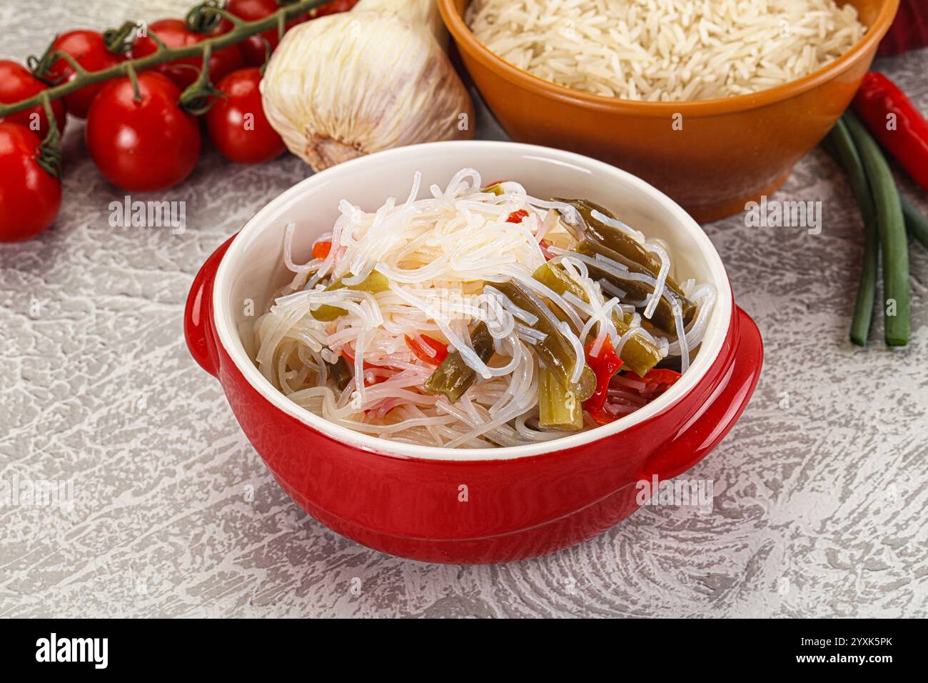Asian cuisine - glass rice noodle with vegetables Stock Photo - Alamy