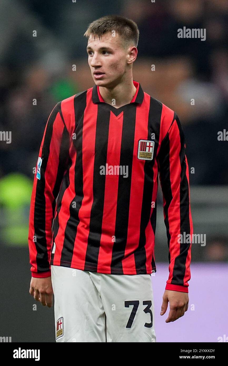 AC Milan's Francesco Camarda, AC Milan's Mattia Liberali during the Serie A soccer match between Milan and Genoa at San Siro Stadium in Milan, North Italy - Sunday, December 15, 2024. Sport - Soccer . (Photo by Spada/LaPresse) Credit: LaPresse/Alamy Live News Stock Photo