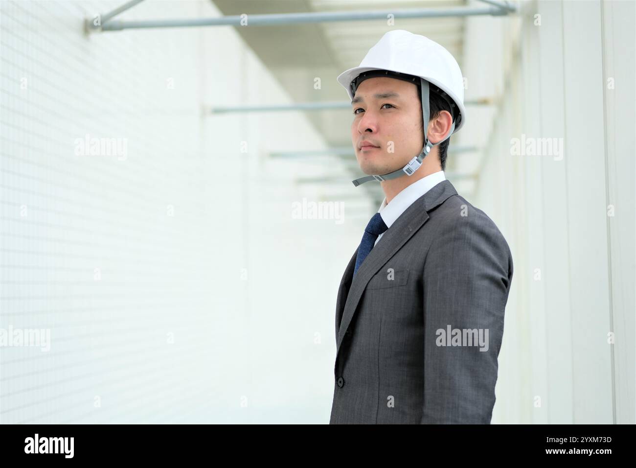 Man wearing suit helmet hi-res stock photography and images - Alamy