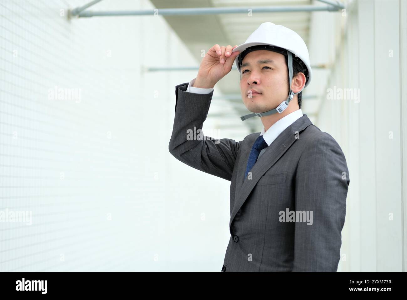 Man wearing suit helmet hi-res stock photography and images - Alamy