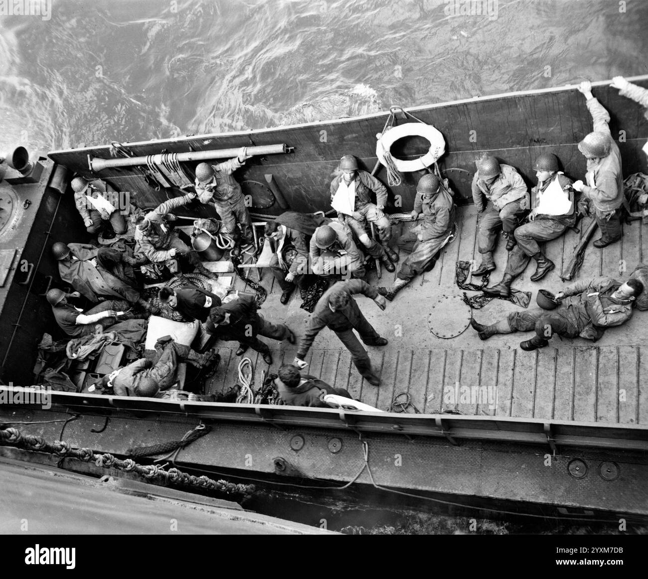 LCM landing craft, evacuating casualties from the invasion beaches, brings them to a transport for treatment, on D-Day, 6 June 1944 - US Army photo Stock Photo