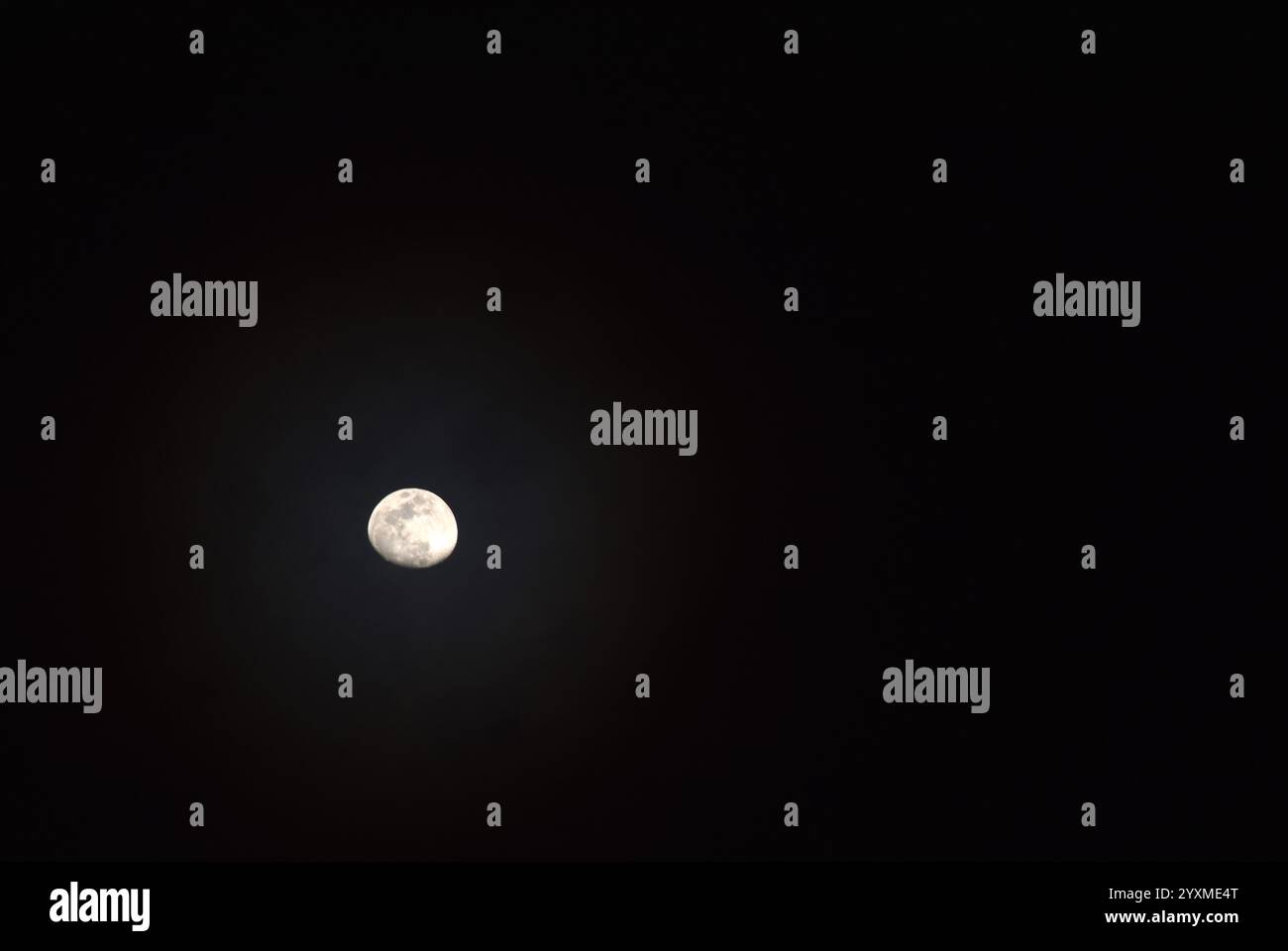 half moon floating on sky in night Stock Photo