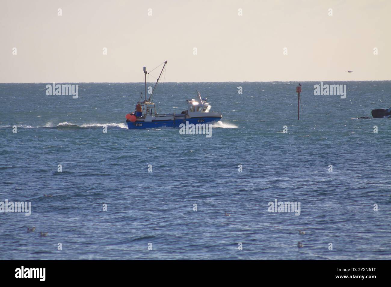 Fishing Trawler returning to Lyme Regis Harbour Dorset England UK 2024 ...