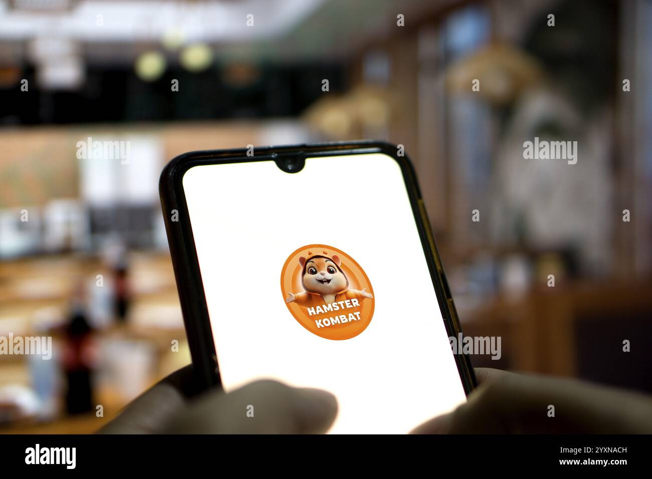 Hamster Kombat telegram bot on smartphone screen. Hamster Kombat is a viral  Telegram based crypto game for earn HMSTR tokens by managing a virtual cry  Stock Photo - Alamy