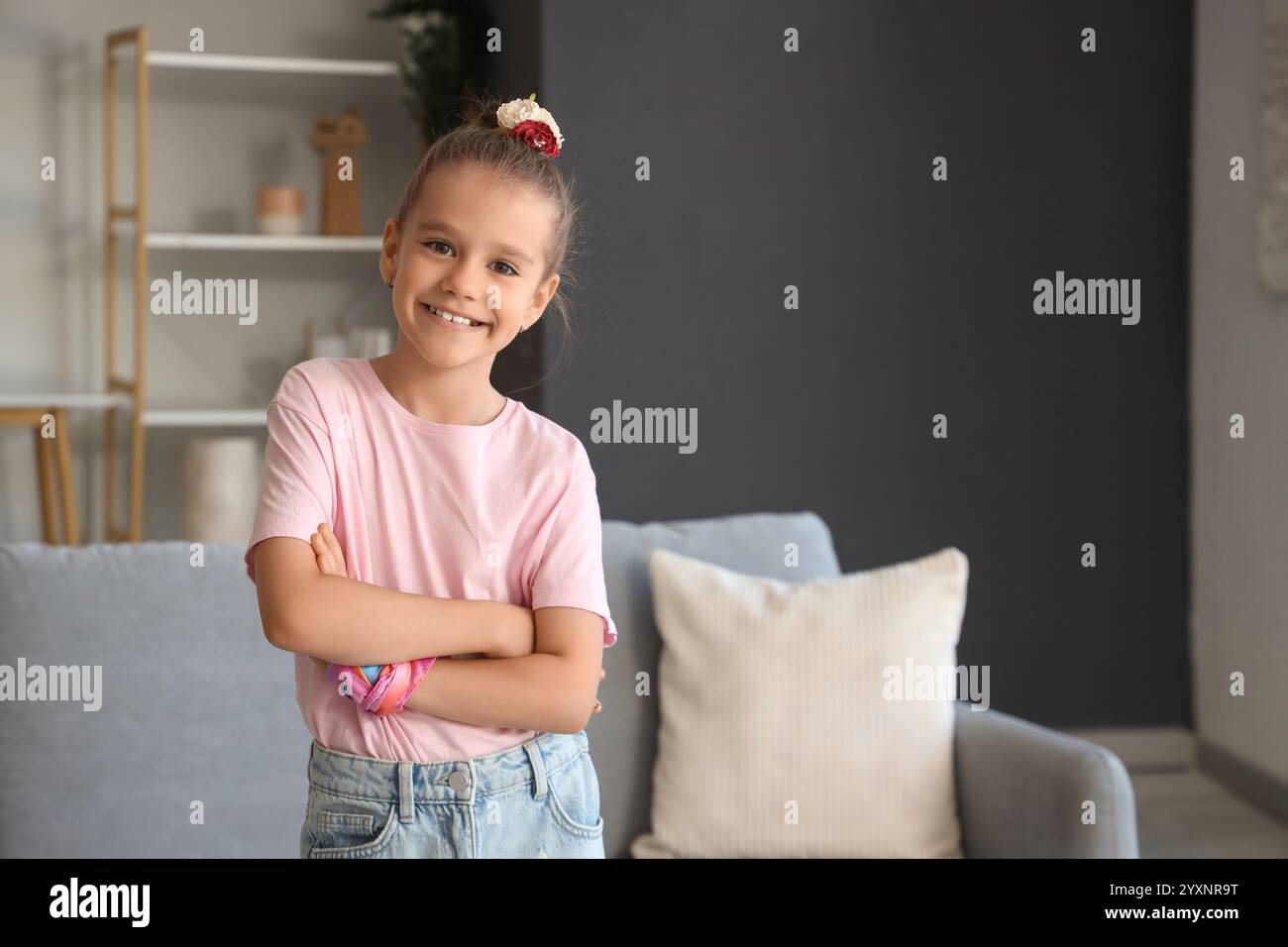 Little girl smiling at home Stock Photo - Alamy