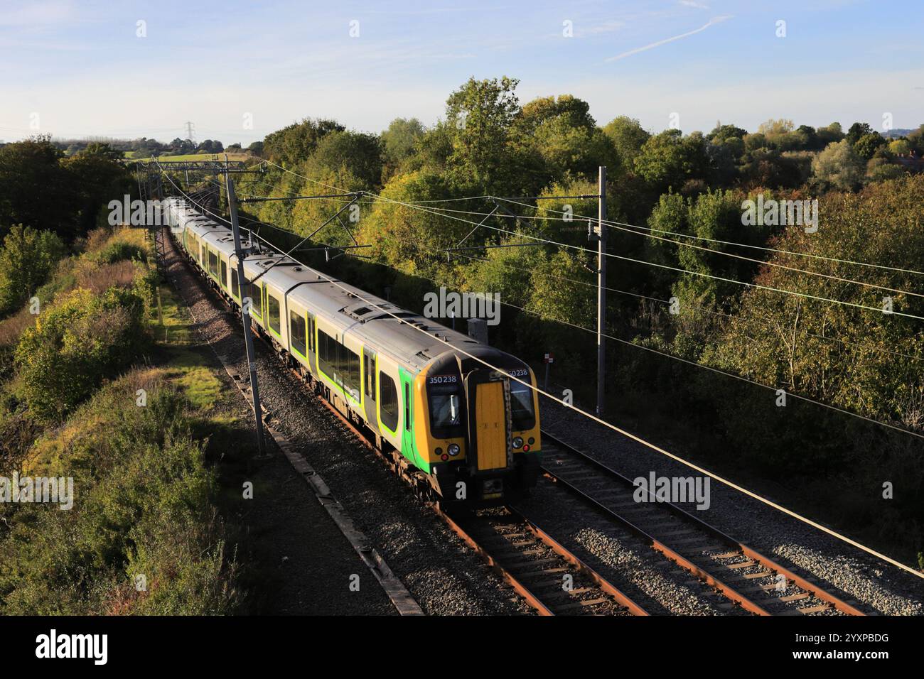 London Northwestern 350 class train, West Coast Main Line near Milton Keynes,, England. On the London Euston to Manchester Piccadilly line Stock Photo