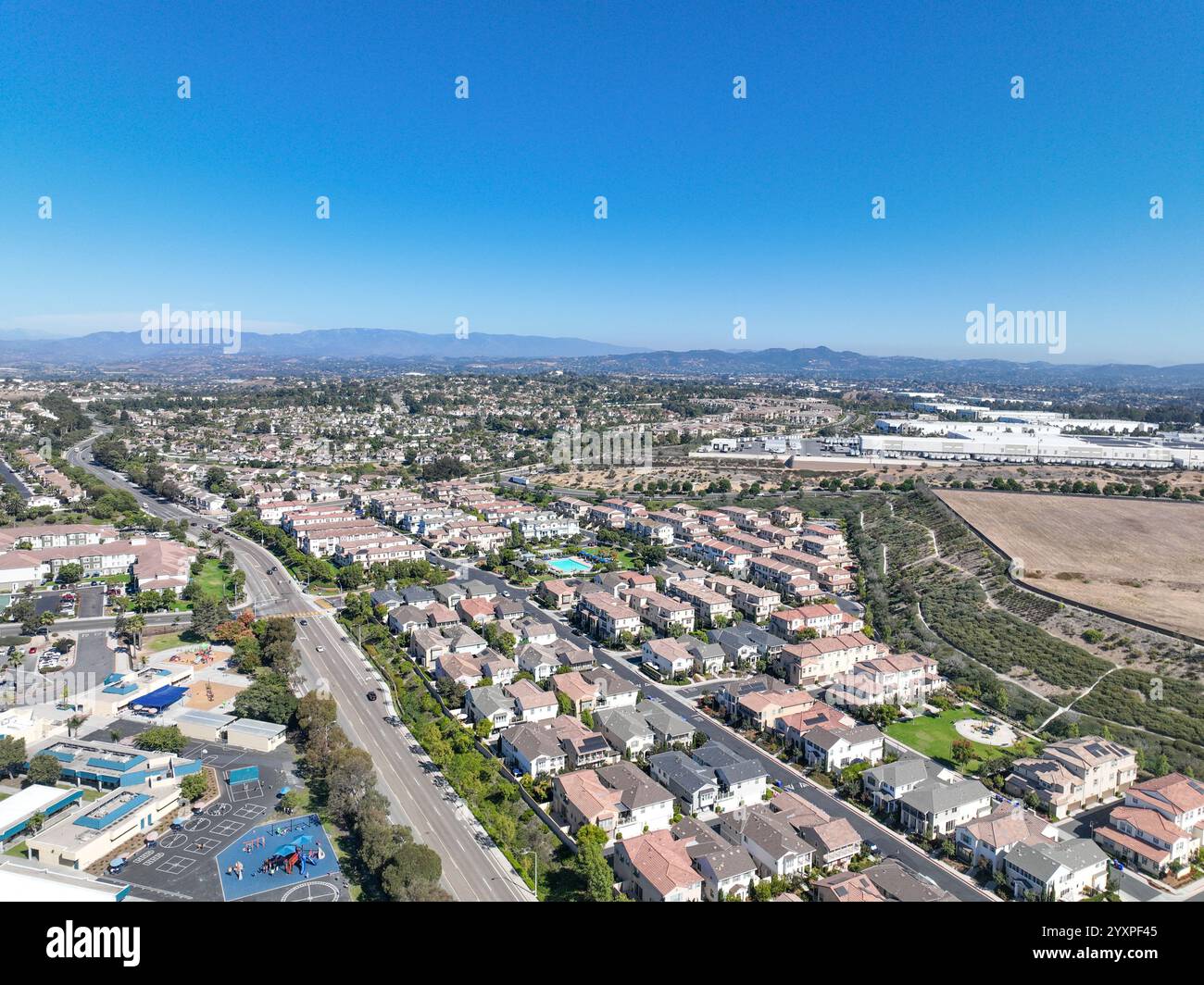 Aerial view of middle class community identical condominium apartment ...