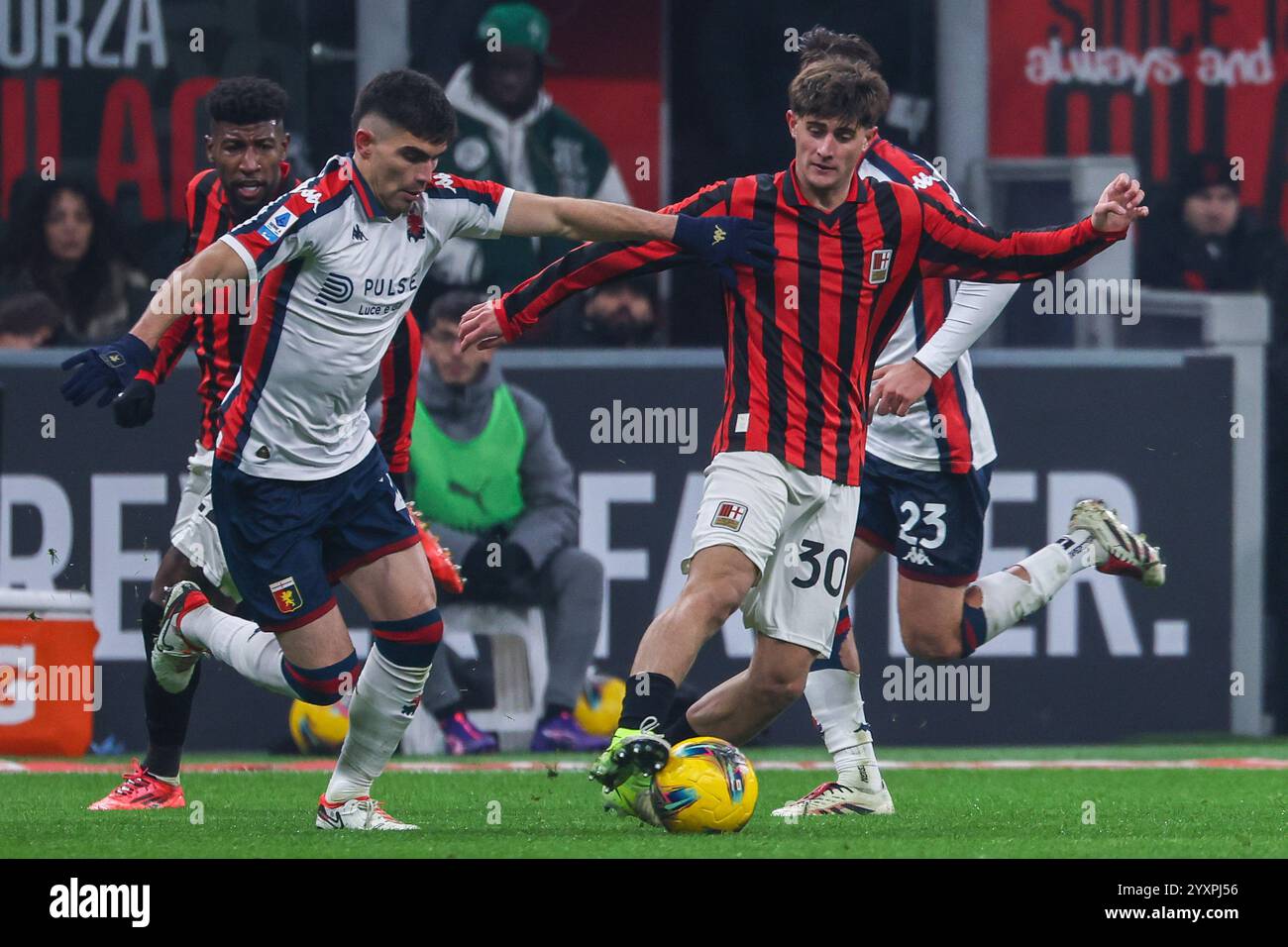 Milan, Italy. 15th Dec, 2024. Mattia Liberali of AC Milan seen in action during Serie A 2024/25 football match between AC Milan and Genoa CFC at San Siro Stadium Credit: Independent Photo Agency/Alamy Live News Stock Photo