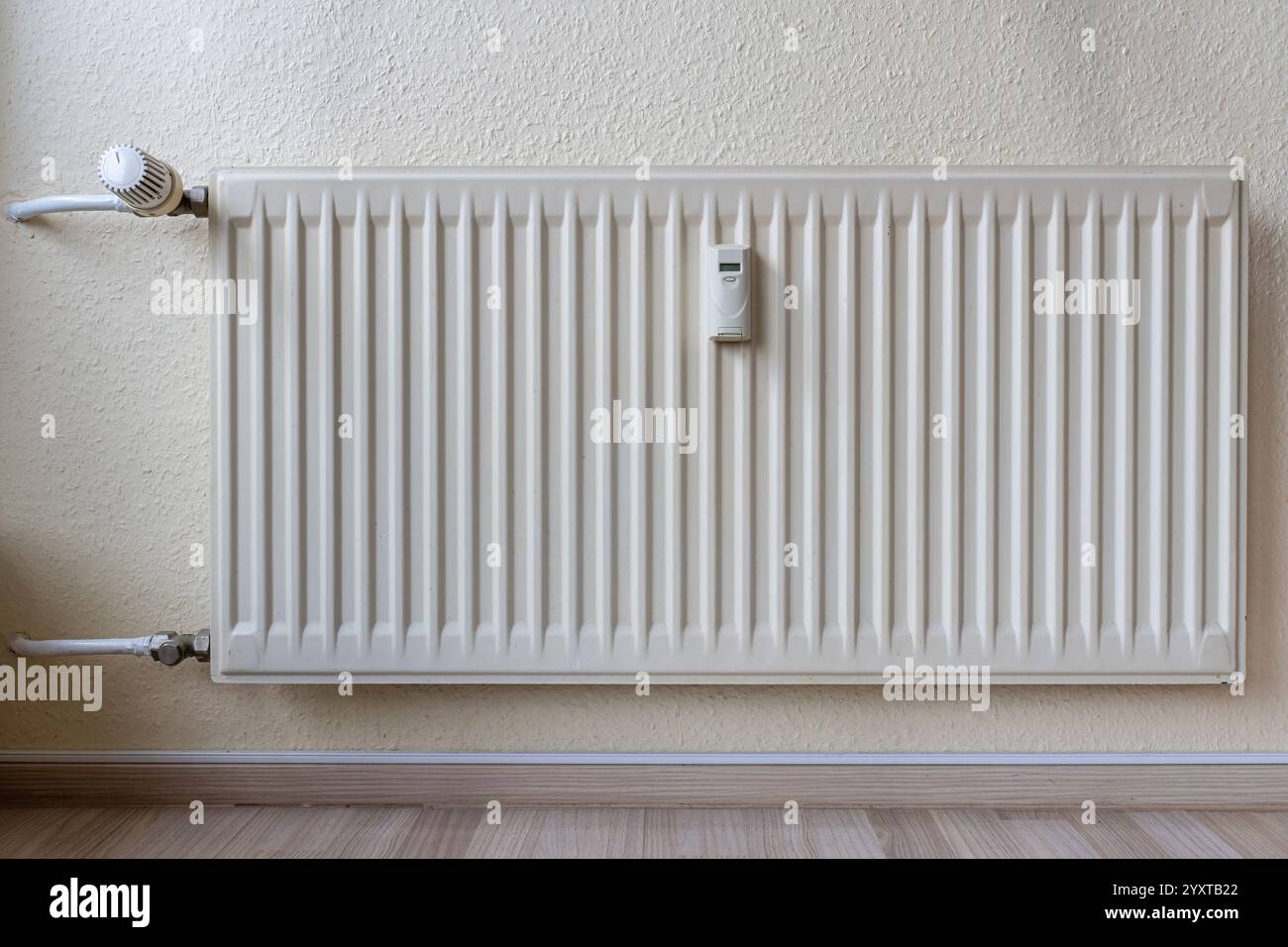 wall mounted radiator in private household Stock Photo