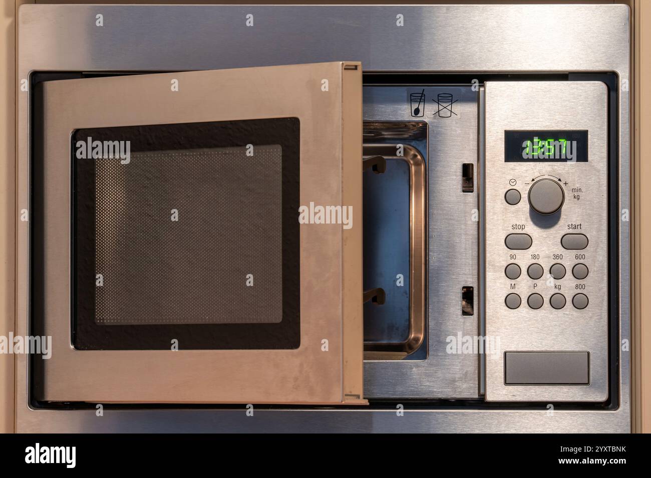 microwave oven in fitted kitchen Stock Photo