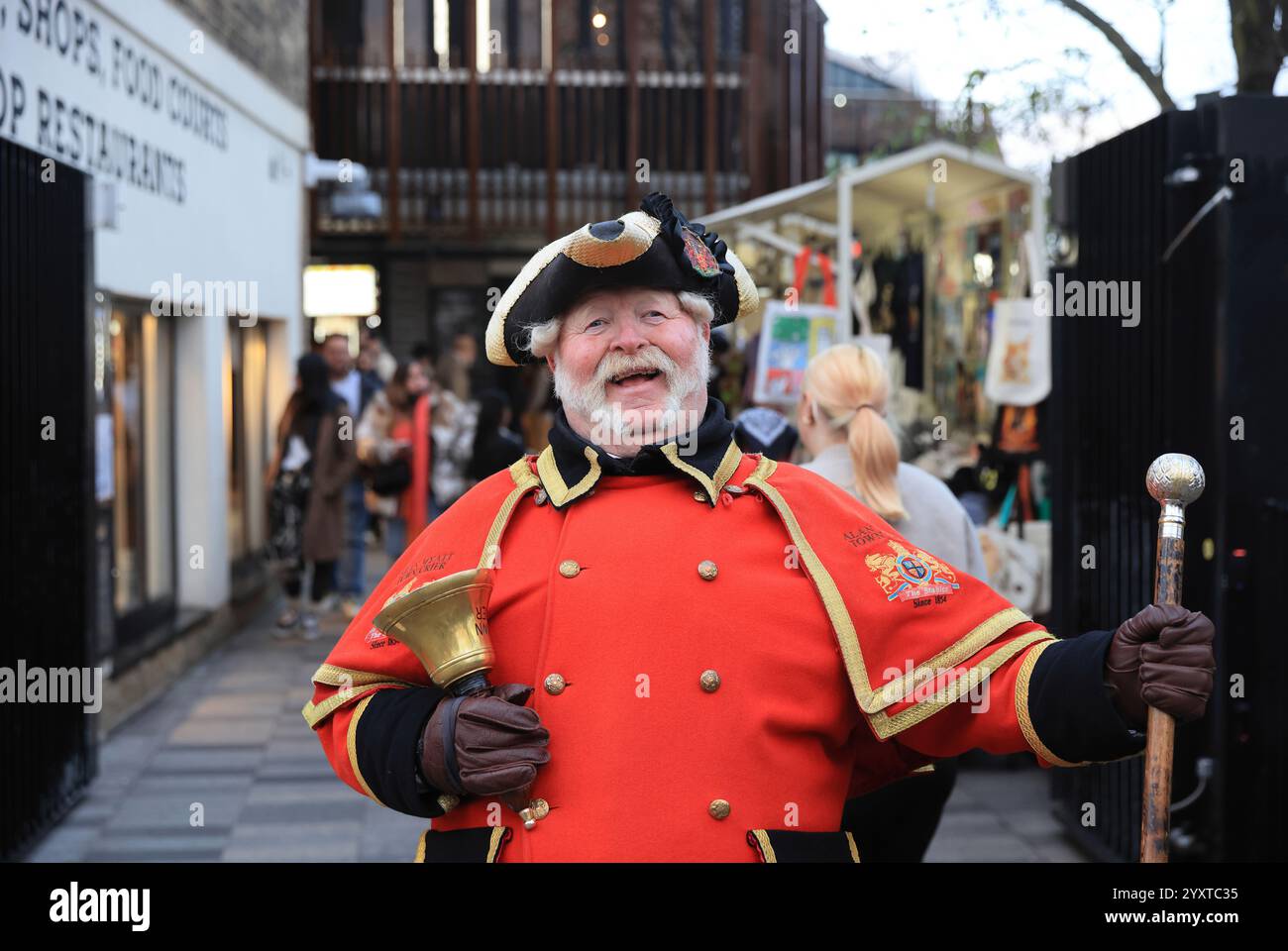 Town crier at Hawley Wharf, part of Camden Market, in north London, UK Stock Photo