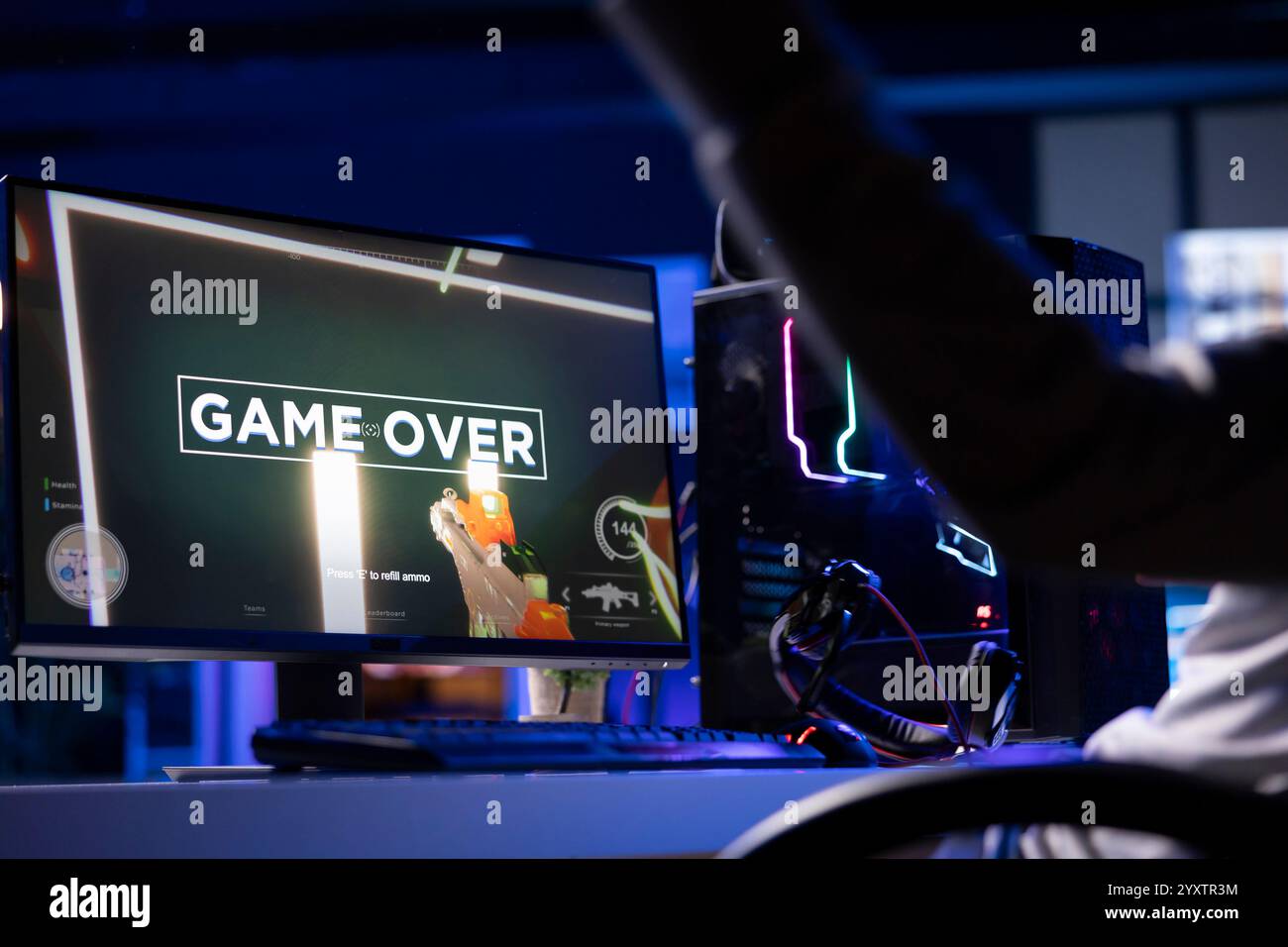 Gamer throwing headphones in frustration after receiving game over ...