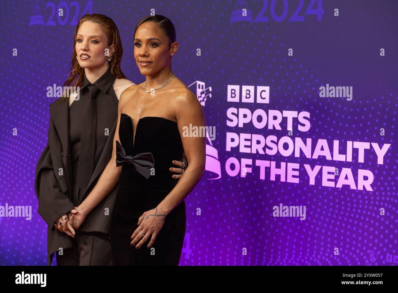 Manchester, UK. 17th Dec, 2024. Alex Scott and partner Jess Glynn at ...