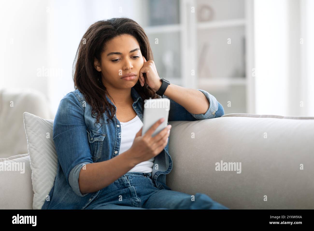 Young black millennial woman distracted hi-res stock photography and ...
