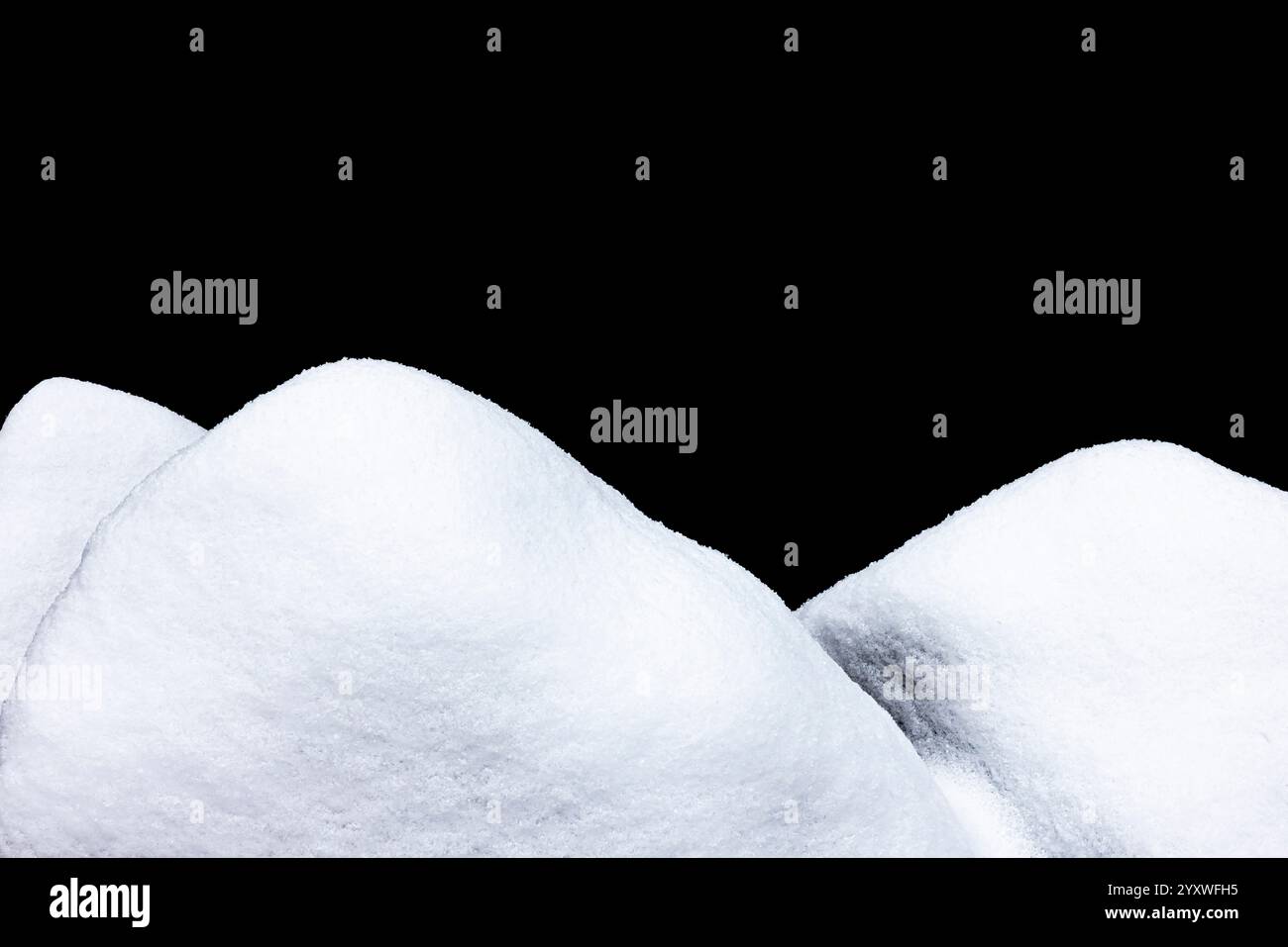 Snowy stones along White River, White Cloud, Michigan, USA Stock Photo