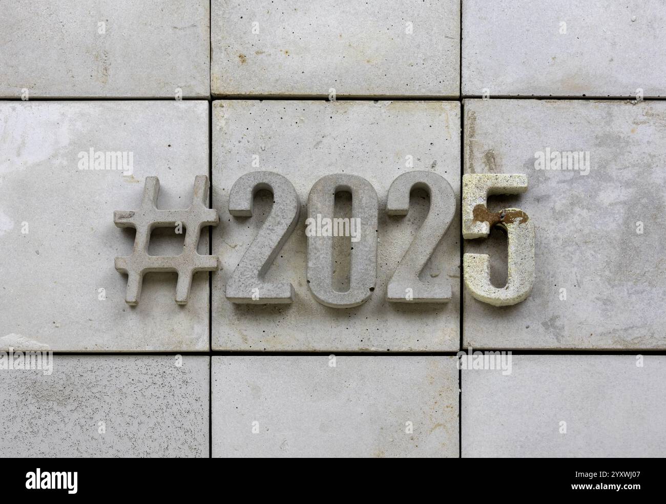 Year 2025 in concrete numbers hashtag Nice copy space happy new year! Stock Photo