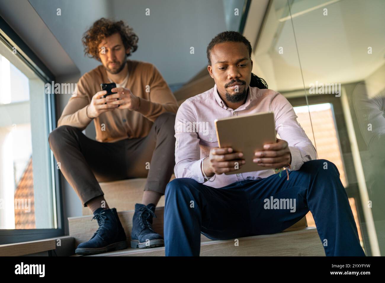 Programmers cooperating at IT company developing apps. People business work office concept Stock Photo