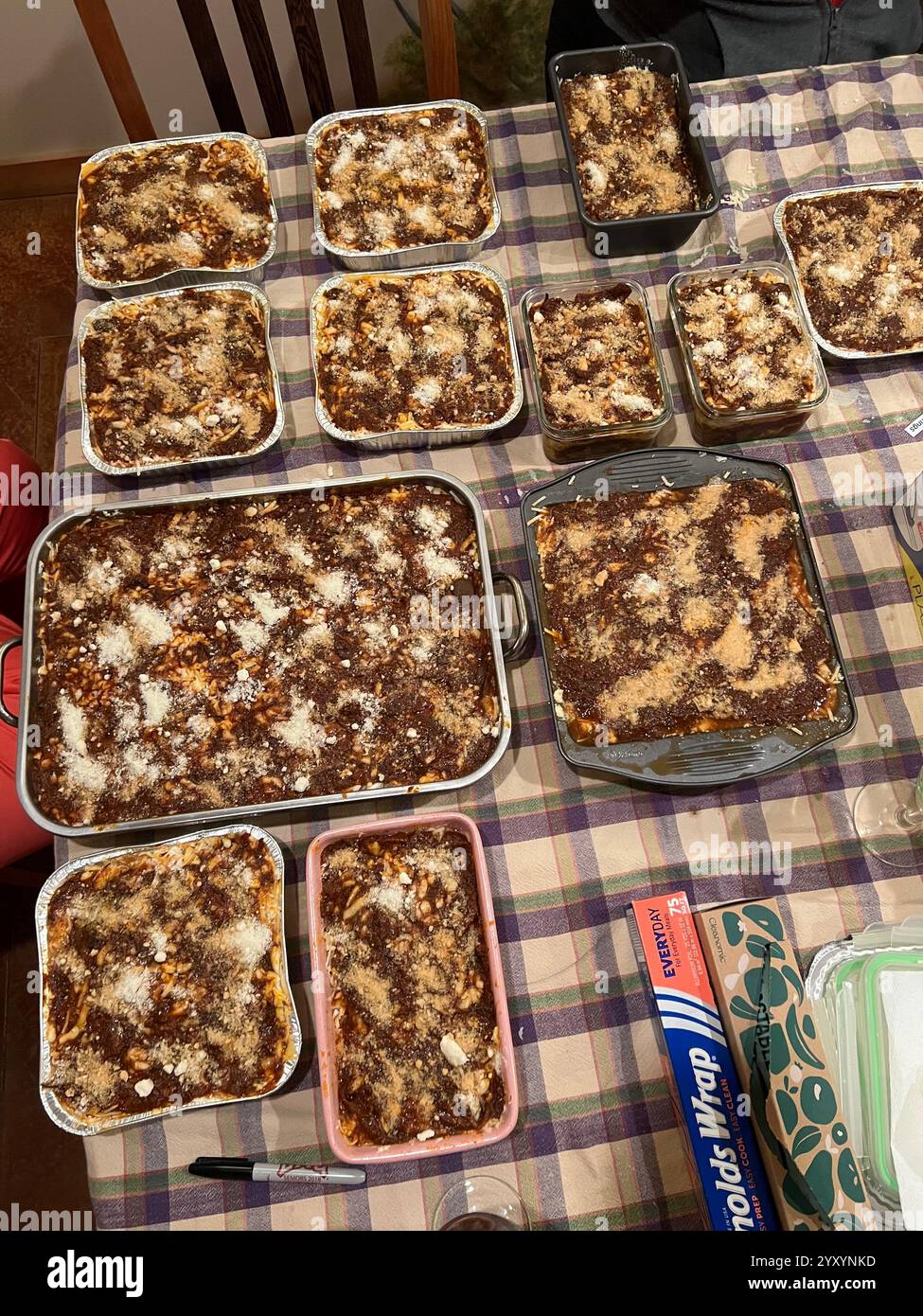 My family and I hosted our annual lasagna making cooking day where we prepare lasagna for everyone to take home to enjoy. - Smartphone Captured Stock Image