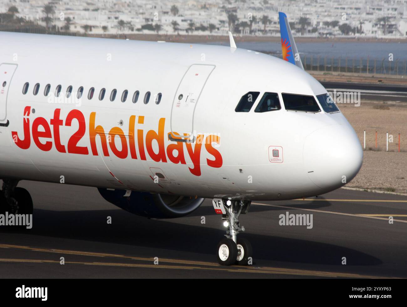 An Airbus A321 of Jet2 in a Jet2 Holidays livery waiting to depart Arrecife Lanzarote airport Stock Photo