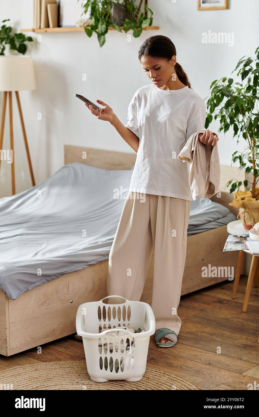 Woman multitasking cleaning hi-res stock photography and images - Alamy